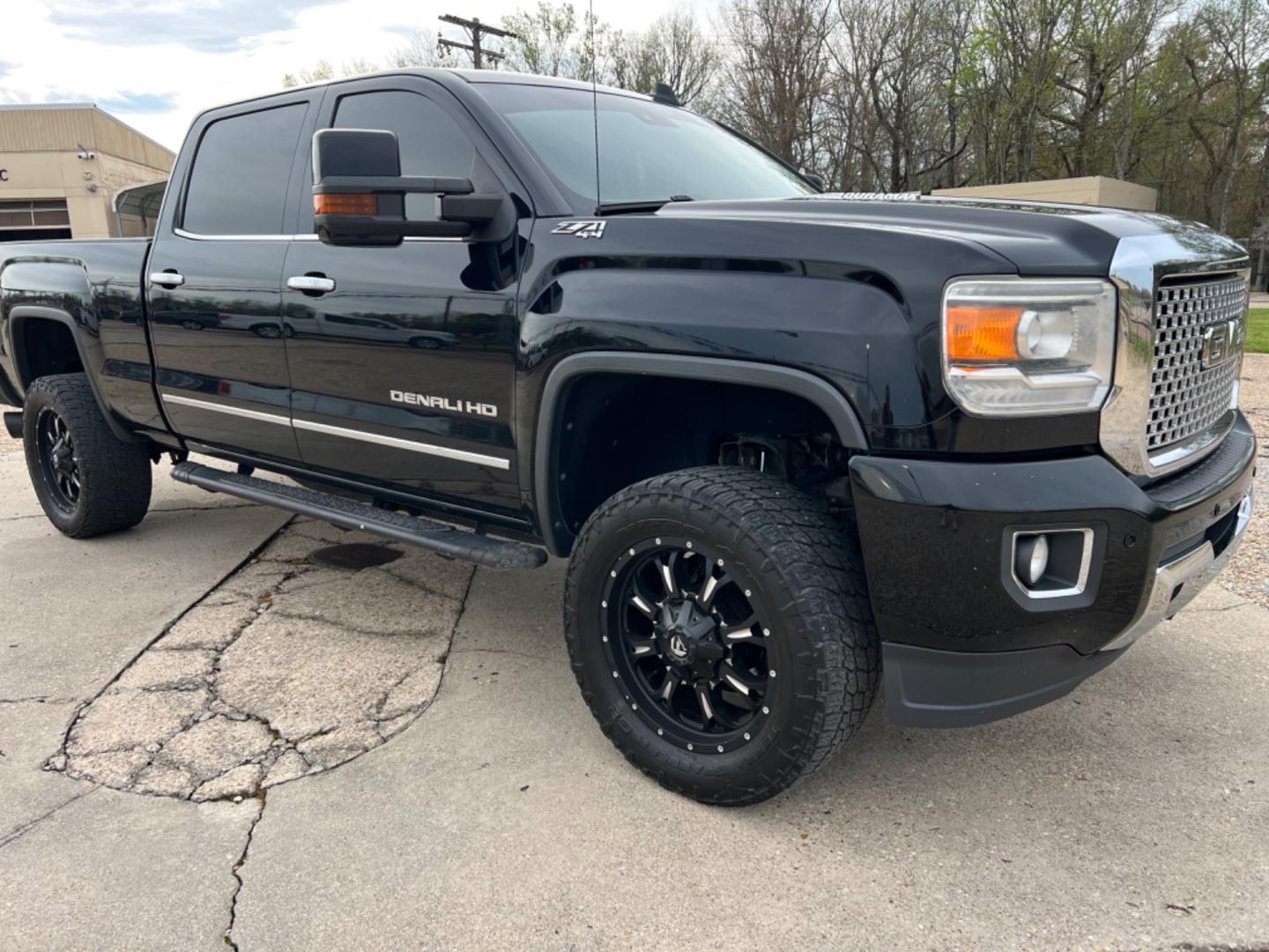 2015 Black /Tan GMC Sierra 2500HD Denali (1GT120E88FF) with an 6.6L Duramax Diesel engine, Allison Transmission transmission, located at 4520 Airline Hwy, Baton Rouge, LA, 70805, (225) 357-1497, 30.509325, -91.145432 - 2015 GMC Sierra 2500HD Crew Cab Denali 4WD 6.6 Duramax Diesel (Deleted), Allison Transmission, 211K Miles, Heated & Cooled Leather Seats, All Power, Backup Camera, Tow Pkg. NO IN HOUSE FINANCING. FOR INFO PLEASE CONTACT JEFF AT 225 357-1497 CHECK OUT OUR A+ RATING WITH THE BETTER BUSINESS BUREAU - Photo#3